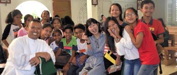 Sihyeon and Columban Fr. Rolly with a youth group in the Philippines,